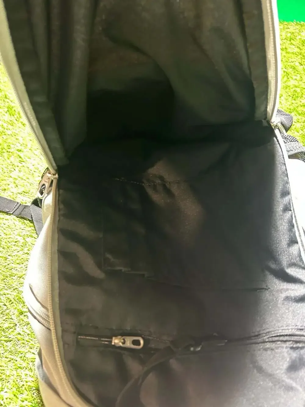 Nike Gray and Black Sport Backpack with Orange Accents